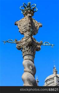 Medieval pillory top on blue sky background. Located on square in front of Porto Cathedral, Portugal.