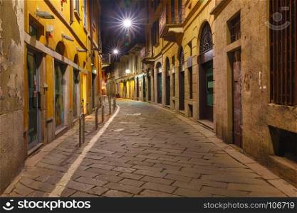 Medieval street at night in Milan, Lombardia, Italy. Typical Italian medieval street at night in the centre of the Old Town of Milan, Lombardia, Italy