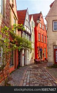 Medieval street Schnoor in Bremen, Germany. Medieval Bremen street Schnoor with half-timbered houses in the centre of the Hanseatic City of Bremen, Germany