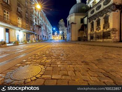 Medieval Town Hall Square in the Old Town at night. Lviv. Ukraine.. Lviv. Town Hall Square at Dawn.