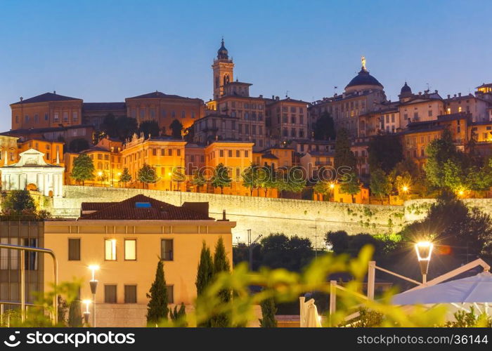 Medieval Upper town Citta alta of Bergamo with towers and churches at sunset, Lombardy, Italy