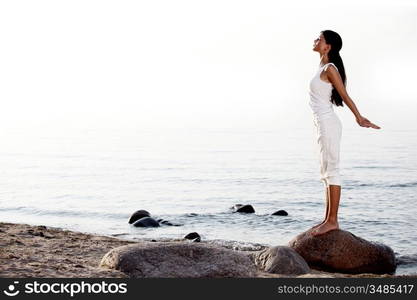 meditation on ocean sand beach