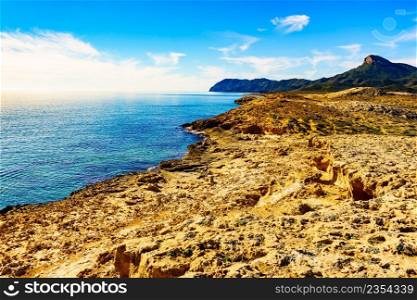 Mediterra≠an sea coast landscape, rocky sea shore in Murcia®ion, Calblanque Regional Park, Spain.. Sea shore, coast landscape in Spain.
