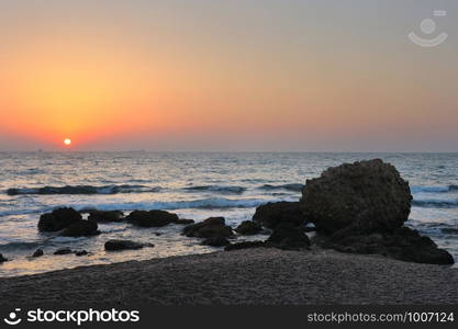 Mediterranean coast in the evening and the setting sun.