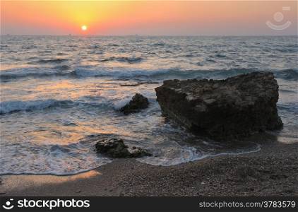 Mediterranean coast in the evening and the setting sun.