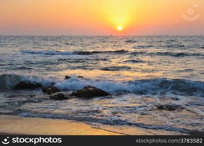 Mediterranean coast in the evening and the setting sun.