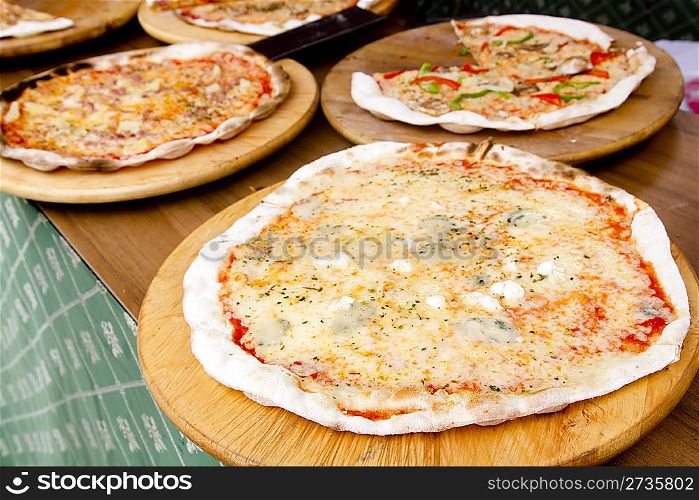 Mediterranean colorful thin pizza baked food focus on foreground