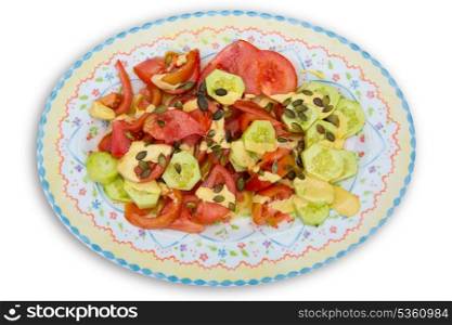 Mediterranean salad with tomato cucumber pumpkin seeds and sauce