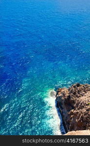 Mediterranean sea foam rocky shore in formentera Barbaria cape