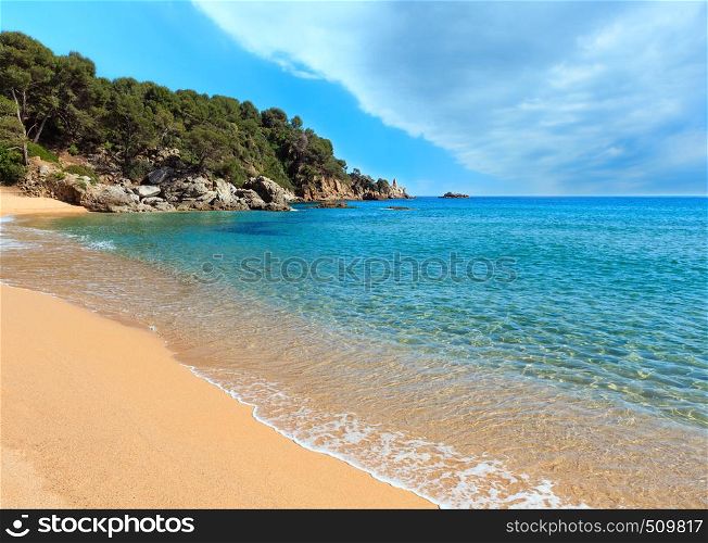 Mediterranean sea rocky coast summer view with sandy beach, Costa Brava, Catalonia, Spain.