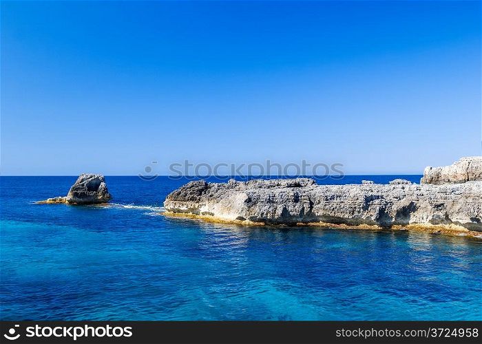 Mediterranean sea scenery with cliffs of Menorca island, Spain.