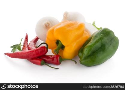 Mediterranean vegetables with red chilli peppers, parsley and bell peppers isolated on white background.