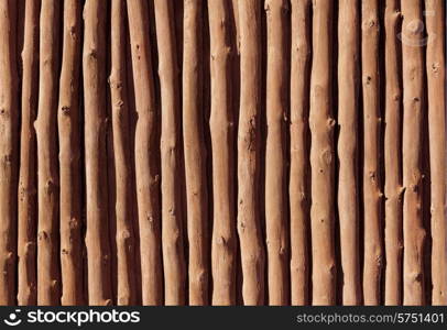 Mediterranean wooden trunks wall texture in Majorca