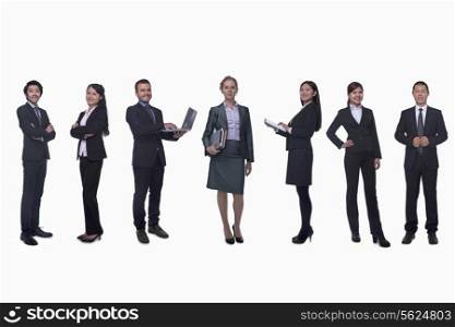 Medium group of business people in a row, portrait, full length, studio shot