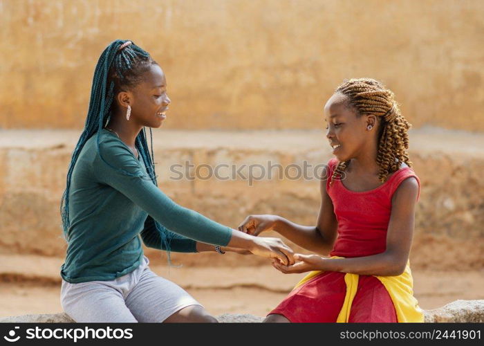 medium shot african girls together