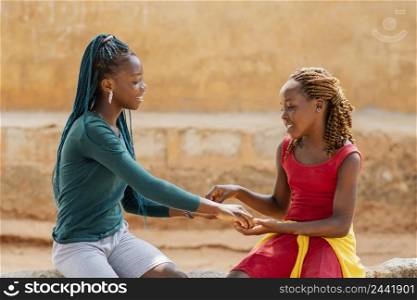 medium shot african girls together