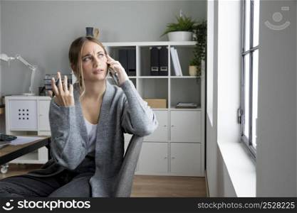 medium shot confused woman talking phone