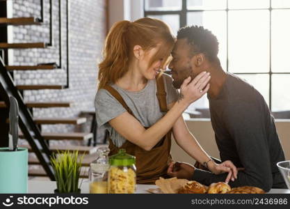 medium shot cute couple sitting