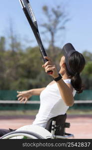 medium shot disabled woman playing tennis