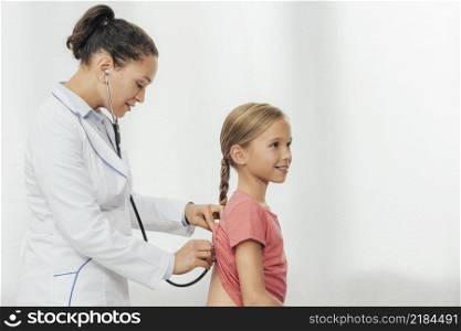 medium shot doctor checking girl