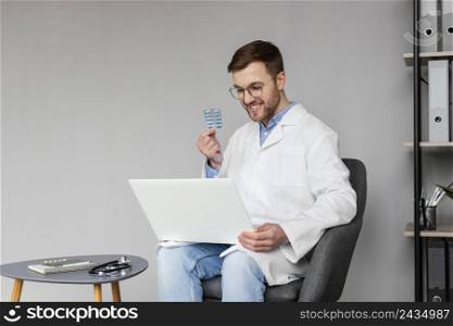 medium shot doctor holding pill blister