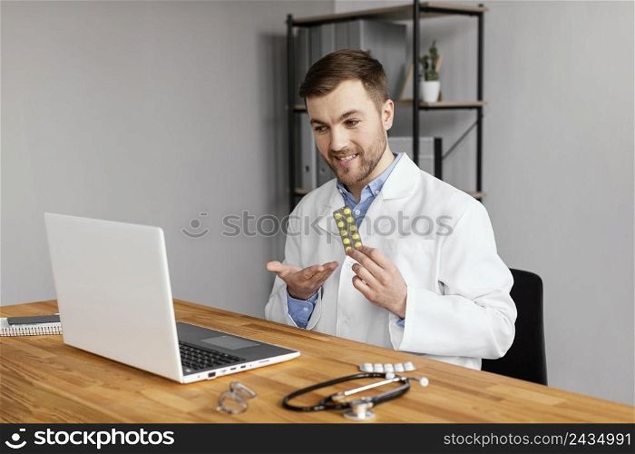 medium shot doctor holding pills
