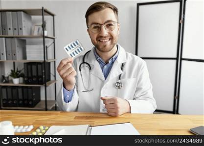medium shot doctor holding pills blister