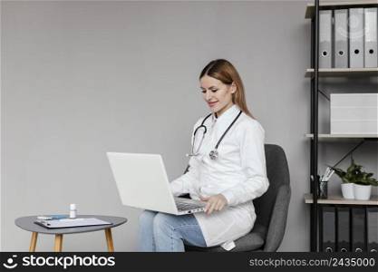 medium shot doctor wearing stethoscope