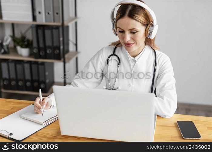 medium shot doctor with headphones