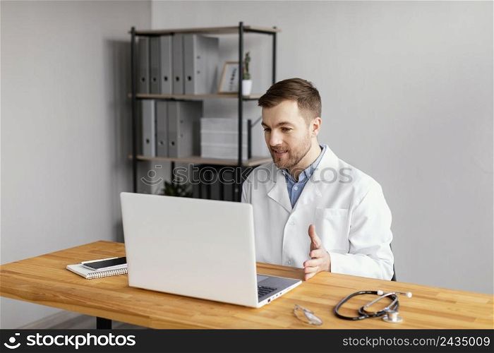 medium shot doctor working desk 3