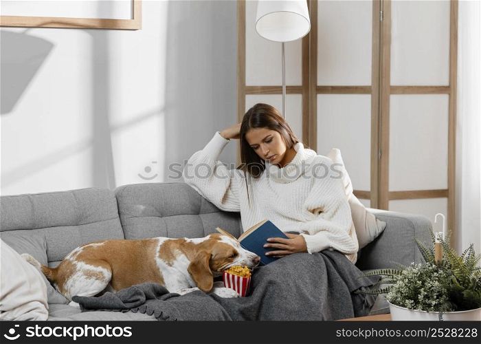 medium shot girl couch with dog