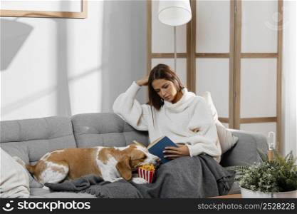medium shot girl couch with dog