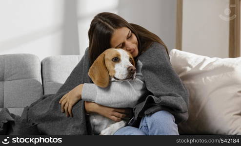 medium shot girl hugging dog