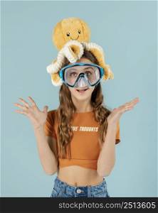 medium shot girl posing with goggles