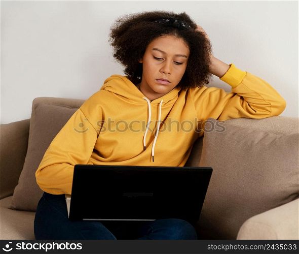 medium shot girl with laptop