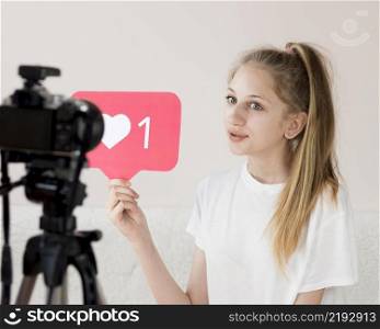 medium shot girl with video camera