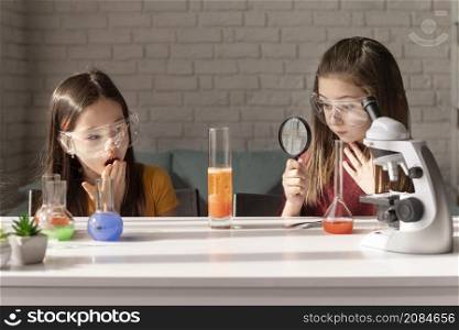 medium shot girls learning science