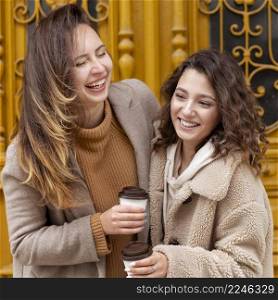 medium shot happy women with coffee