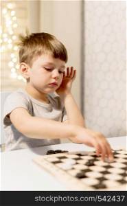medium shot kid playing chess