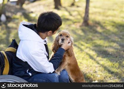 medium shot man petting dog