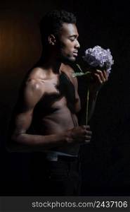 medium shot man posing with flower