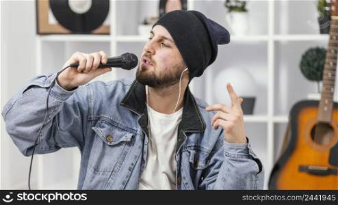 medium shot man singing microphone
