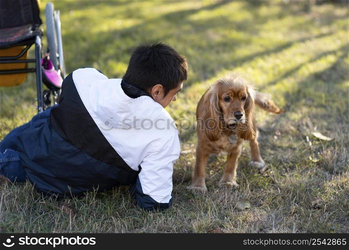 medium shot man with dog outdoors