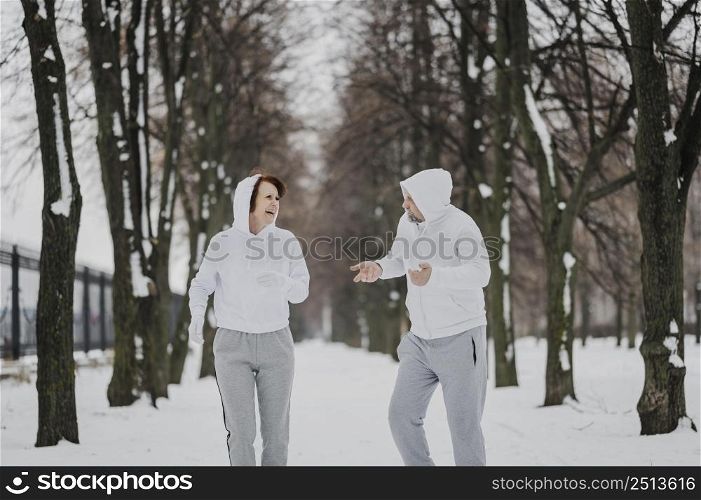 medium shot man woman jogging