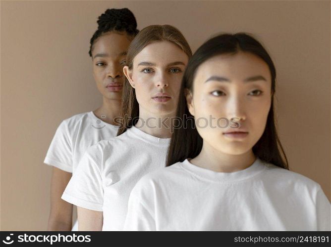 medium shot multicultural women posing