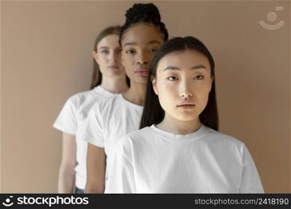 medium shot multicultural women posing together