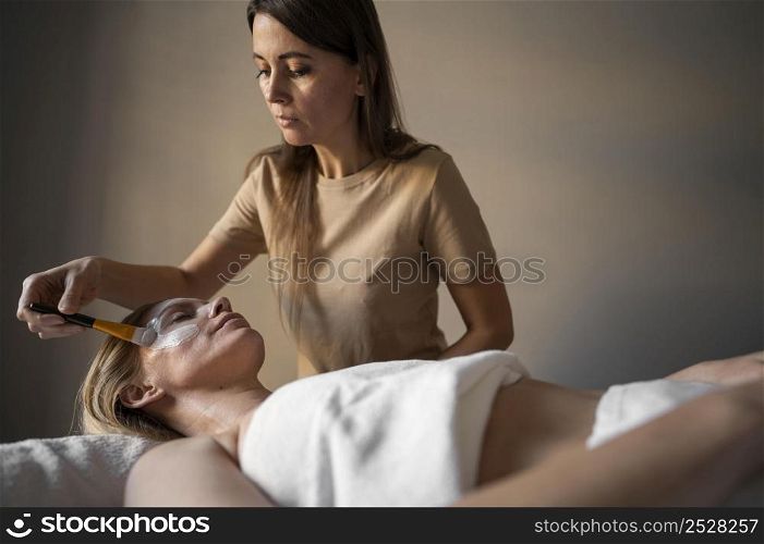 medium shot patient with face mask