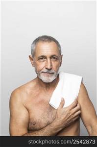 medium shot senior man with towel