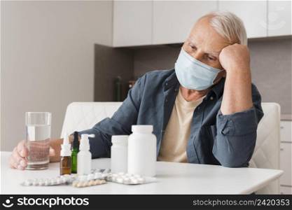 medium shot sick man wearing medical mask