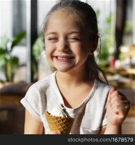 medium shot smiley girl with ice cream